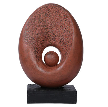 Oval shaped sculpture with central circle & space